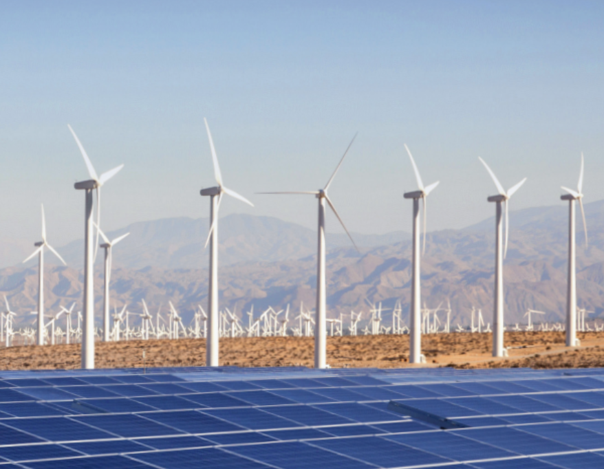 Image of wind turbines and mountains